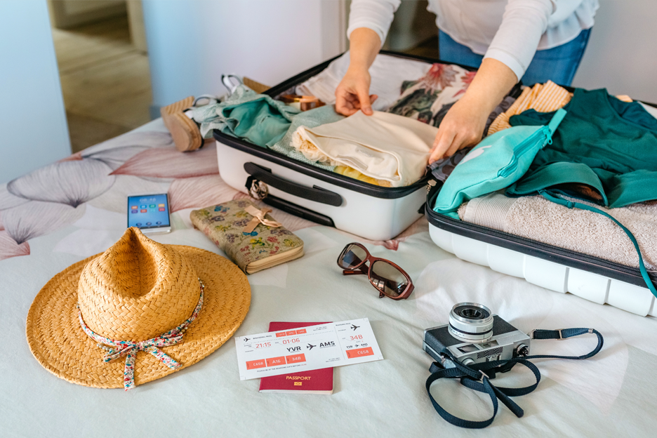 A suitcase containing all the necessary items for a trip. 