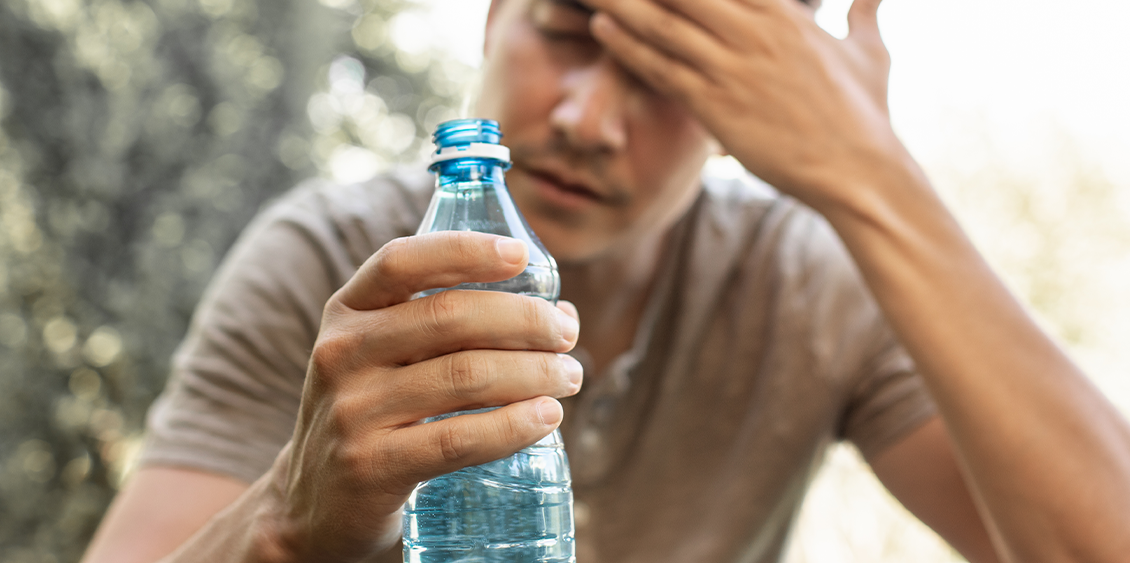 A woman sitting on a bus experiences symptoms of malaria.
